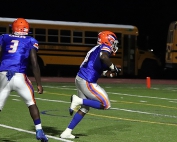 Columbia's Kenyon Partridge (with ball) returns a fumble recovery 19 yards for a touchdown in Columbia's 20-0 win over Washington on Thursday night at Avondale Stadium. (Photo by Mark Brock)