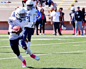 Chapel Hill's TyShawn Kirkwood (5) makes a move up the field during his team's 42-0 win over the Chamblee Bulldogs. Kirkwood scored two touchdowns (1 rushing, 1 receiving) in the win. (Photo by Mark Brock)