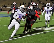 Lakeside's Jean-Luc Noison (6) gets away for a 38-yard touchdown run, his second TD of the night, as the Lakeside Vikings secure their first winning season since 2003 with a 40-18 victory over Stone Mountain. (Photo by Mark Brock)