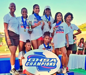 The Druid Hills Lady Red Devils finished second in the Class 4A girls' state meet for the second consecutive season. They led a group of five girls' teams from DeKalb to finish in the Top 10. (Courtesy Photo)