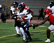 Towers running back Neroy Tugwell shown in action against McNair in 2023 had a pair of touchdowns in the Titans 54-7 win to open the season. Tugwell and the Titans take on Landmark Christian on Thursday (tonight) in a 7:00 pm game at Cobb (Avondale Stadium). (Photo by Mark Brock)