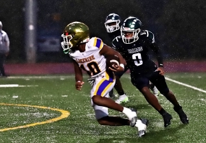 Lakeside's Jayson Michel (10), shown here against Arabia Mountain earlier this sesaon, scored a big third quarter touchdown on a 21-yard pass from Kyle Davis to extend Lakeside's lead in 34-31 win over Dunwoody. (Photo by Mark Brock)