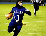 Redan's Londyn Felder was on the run against LaGrange in a 34-0 playoff win for the Lady Raiders. (Photo by Mark Brock)