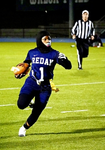 Redan's Londyn Felder was on the run against LaGrange in a 34-0 playoff win for the Lady Raiders. (Photo by Mark Brock)