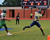 Southwest DeKalb star receiver Sam Turner (shown catching a TD pass against Clarkston) got to be on the other end as he took the backwards pass from Braylon Carter and threw to Ramique Thomas for what turned out to be an 80-yard scoring play in the 70-7 win over North Springs on Friday. (Photo by Mark Brock)