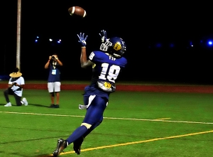 Southwest DeKalb's Samuel Turner hauls in an overtime touchdown pass from Braylon Carter against St. Pius. (Photo by Mark Brock)