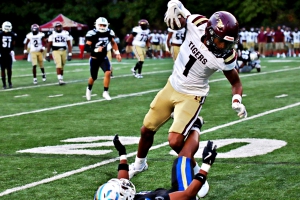 Eli Ffrench (1) and his Tucker Tiger teammates host the Northview Titans in a game moved from Thursday to tonight at 6:30 pm at North DeKalb Stadium. (Photo by Mark Brock)