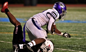 Miller Grove's Jarius Goldwire (with ball) shown in action vs. Druid Hills earlier this season scored the winning touchdown on a five-yard toss sweep in the fourth quarter of a 7-0 win over previously undefeated Heritage (Conyers). (Photo by Mark Brock)