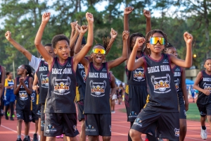 Track stars from Barack Obama Elementary School celebrate their 2024 DCSD County Track Championship. (Photo by Curtis Jones)