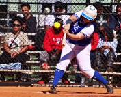 Chamblee pitcher Gali Nelson hits an RBI single to aid her own cause on the mound during Chamblee's 20-1 game 2 win to sweep the series against Dutchtown. (Photo by Mark Brock)