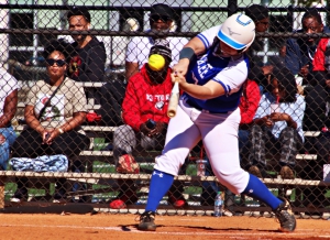 Chamblee pitcher Gali Nelson hits an RBI single to aid her own cause on the mound during Chamblee's 20-1 game 2 win to sweep the series against Dutchtown. (Photo by Mark Brock)