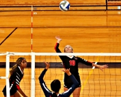 Druid Hills outside hitter Hannah Angel (10) goes up for a shot against Dunwoody earlier this season. Angel and her Druid Hills' teammates fell in the second round of the Class 4A state volleyball playoffs. (Photo by Mark Brock)