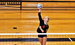 Druid Hills' Caroline Rogers (8) and her Red Devils teammates upended No. 2 seed New Hampstead 3-1 in a Class 4A state playoff road victory on Tuesday. (Photo by Mark Brock)