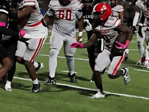 McNair's Anterrion Theodore (0) ran for 129 yards and a touchdown to help lead the McNair Mustangs to a 27-18 win over the Towers Titans on Thursday night. (Photo by Mark Brock)