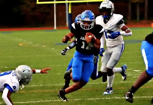 Stephenson's Marte Barton (12) keeps for the first of his three touchdown runs on the night in the Jaguars' 38-14 Region 5-3A win over the Mt. Zion Bulldogs. (Photo by Mark Brock)