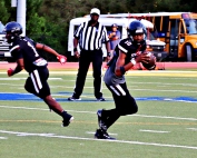 Towers quarterback Quaricus Hurley leads the Titans against the McNair Mustangs on Thursday night. The teams are tied at 11-11 in the series as they get set to play for the 23rd time. (Photo by Mark Brock)