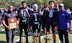 <center><strong>Trail to the Title MVPS</center></strong>The Trail to the Title Championship MVPS were named following the game (l-r) Cedar Grove coach Adam Smith, Daquarrion Trammell (Offense), Zack Bell (Game MVP), Kaysean Moses (Defense) and DCSD Middle School Athletics Coordinator Paris Burd. (Photo by Mark Brock)