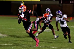 Columbia's Durante Speer (5) runs with a pass reception in action against Miller Grove earlier this season. Speer and his teammates take on defending state champion Pierce County on Friday in the second round of the Class 2A state playoffs. (Photo by Mark Brock)