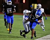 Stephenson's Jayden Johnson (with ball) tight rope's down the sideline against North Clayton earlier this season. The Jaguars host Whitewater in the first round of the Class 3A state playoffs on Friday at Hallford Stadium. (Photo by Mark Brock)