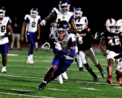 Southwest DeKalb receiver Jordan Christie (1) cuts up field on the way to 24-yard touchdown reception during the Panthers 48-14 Region 5-4A win over Druid Hills. The Panthers sewed up second place and a home game in the state playoffs. (Photo by Mark Brock)