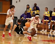 Dunwoody's Emerson Mitchell (1) heads up the court following a steal late in the fourth quarter of the Wildcats 42-37 Region 4-5A win over the Lakeside Vikings. Mitchell hit seven of eight free throws in the fourth quarter to help rally Dunwoody to the win. (Photo by Mark Brock)