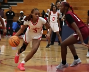 Stone Mountain's Dalys Monfait (3) drives against Mrartin Luther King's Kaleah Gibson (14) during the Lady Pirates win over the Lady Lions. (Photo by Mark Brock)