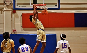 Southwest DeKalb's Aaron Burks (11) flushes the alley-oop pass from Thomas Glanton III in front of Columbia defenders Brandon Bigsby (23) and Xavier Lewis (15). (Photo by Mark Brock)